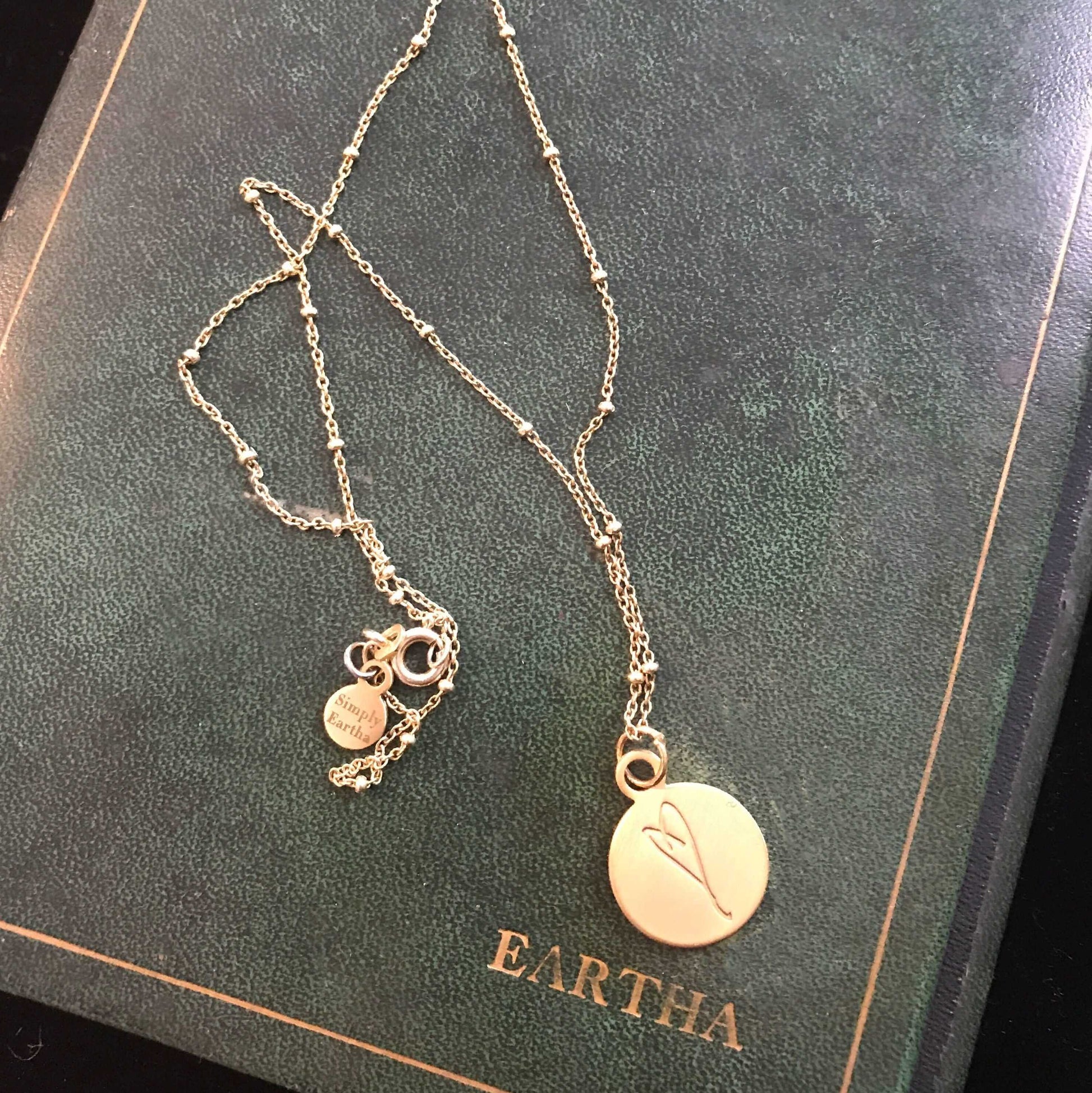 Eartha Kitt's journal with Her Heart necklace