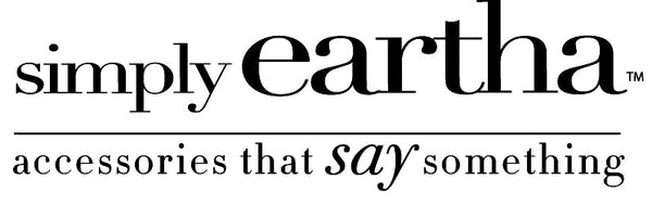 Logo for Simply Eartha, featuring the text "simply Eartha" above a line, with "accessories that say something" below. The word "say" is italicized.